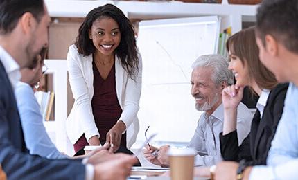 Employees discussing the strategy together at the meeting